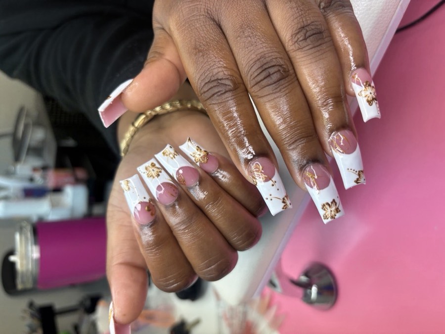 Nail sets, pedicures and lashes by Asia Marie