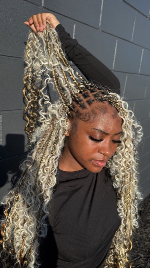 Braiding and locks by LaRonda McCray